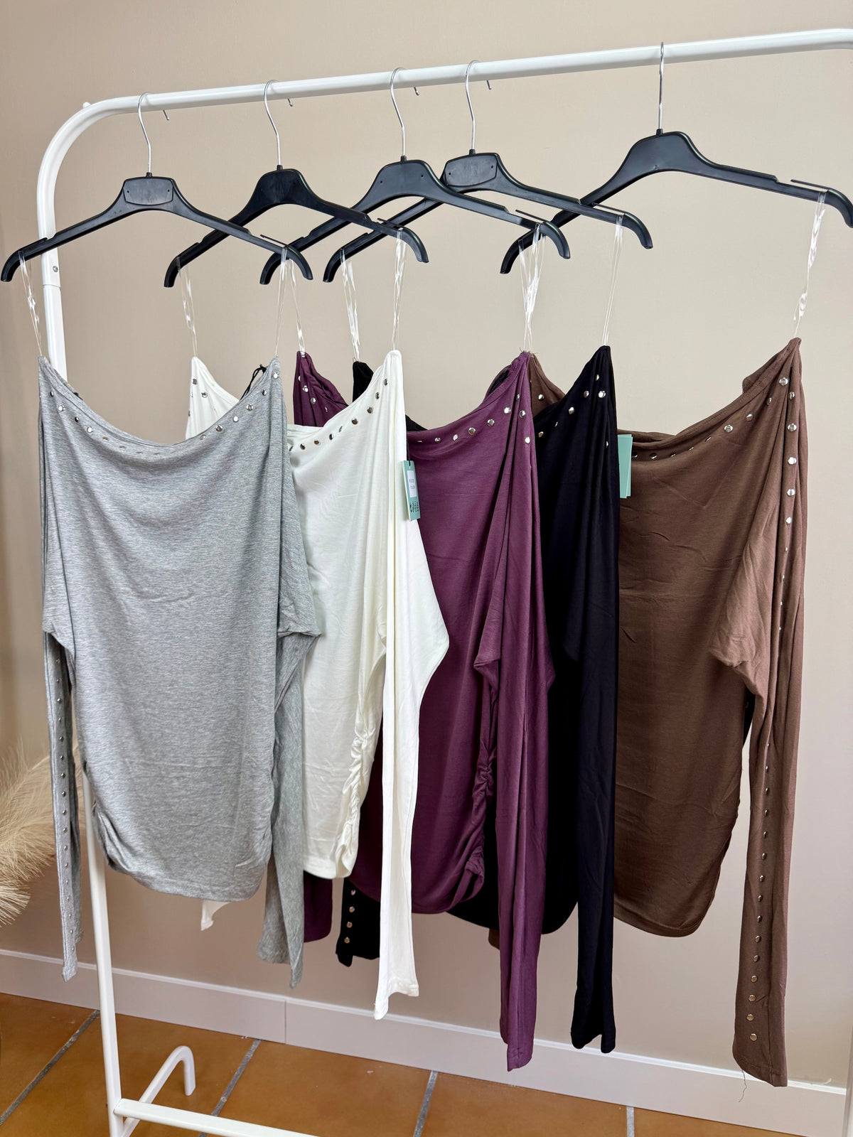 Blusa tachuelas